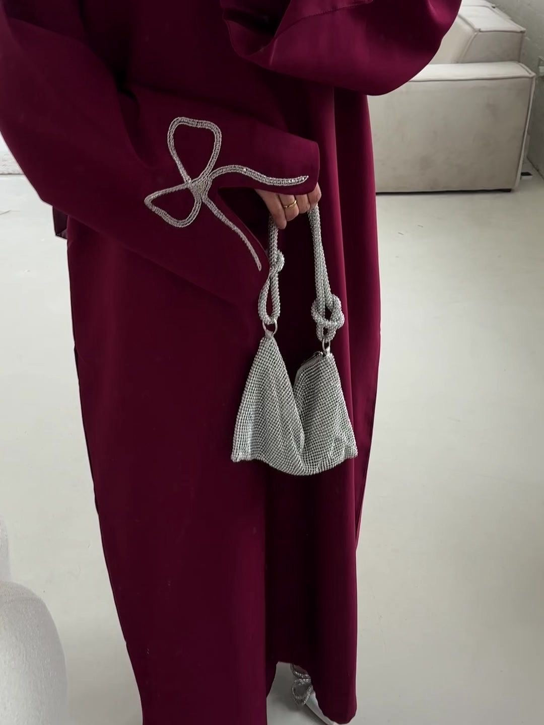 Grace In Every Detail – Cherry-Fawn Closed Abaya With Handcrafted Silver Bow Sleeves