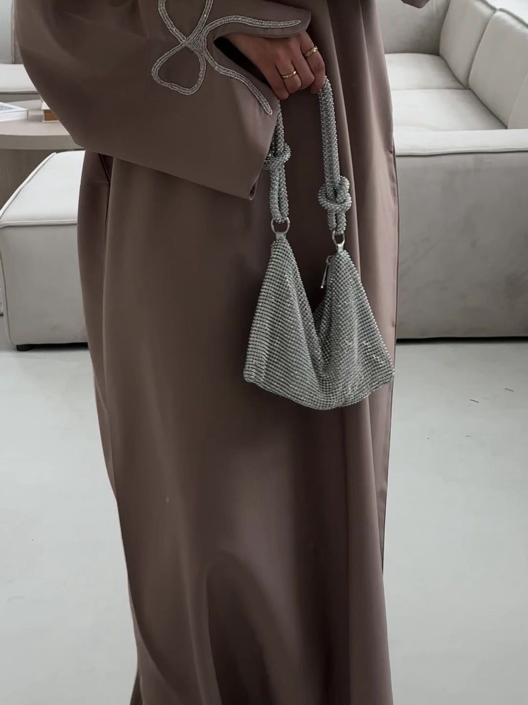 Grace In Every Detail – Cherry-Fawn Closed Abaya With Handcrafted Silver Bow Sleeves